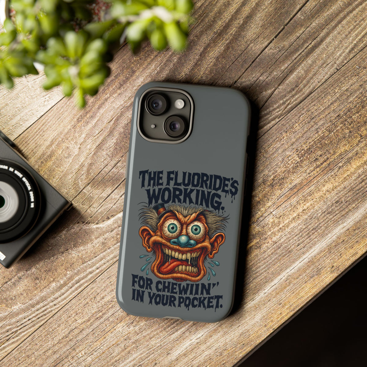 Phone Case — Retro Horror Graphic “The Fluoride’s Working” Shock Art