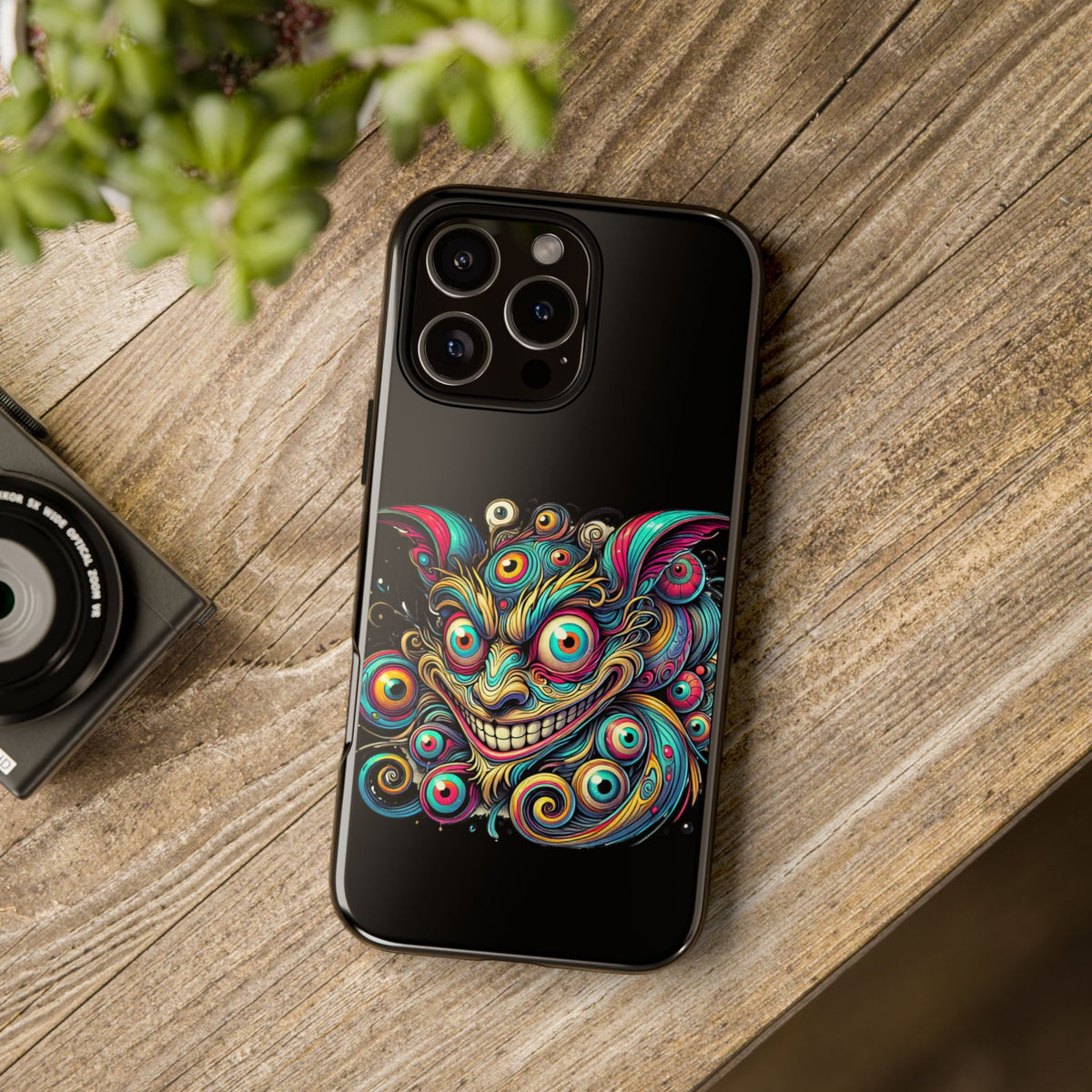Psychedelic Mischief Phone Case — Colorful Grinning Monster Design