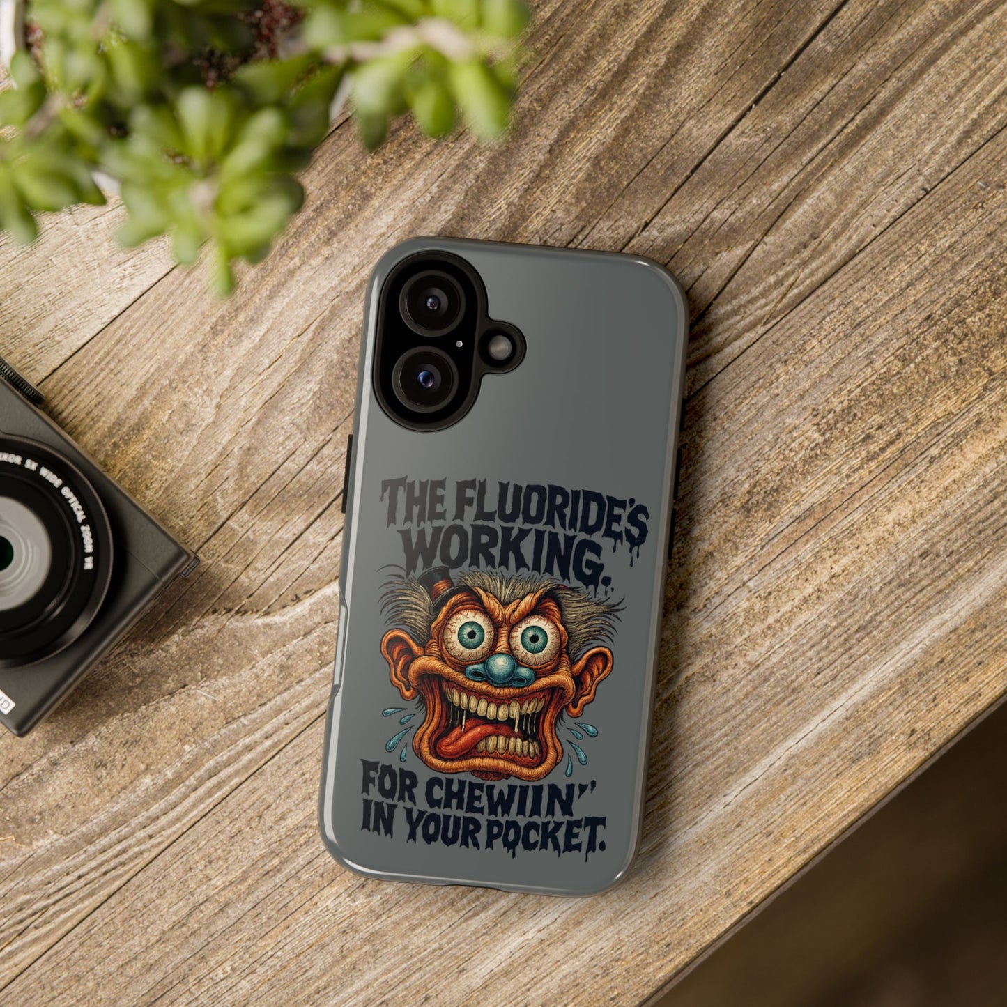Phone Case — Retro Horror Graphic “The Fluoride’s Working” Shock Art