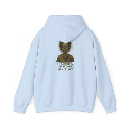 Hoodie — "Cursed to Rise Before Coffee Was Brewed" Haunted Morning Graphic