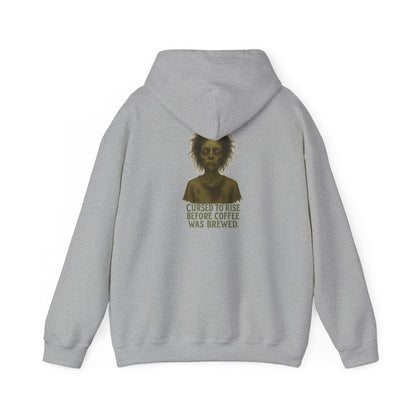 Hoodie — "Cursed to Rise Before Coffee Was Brewed" Haunted Morning Graphic