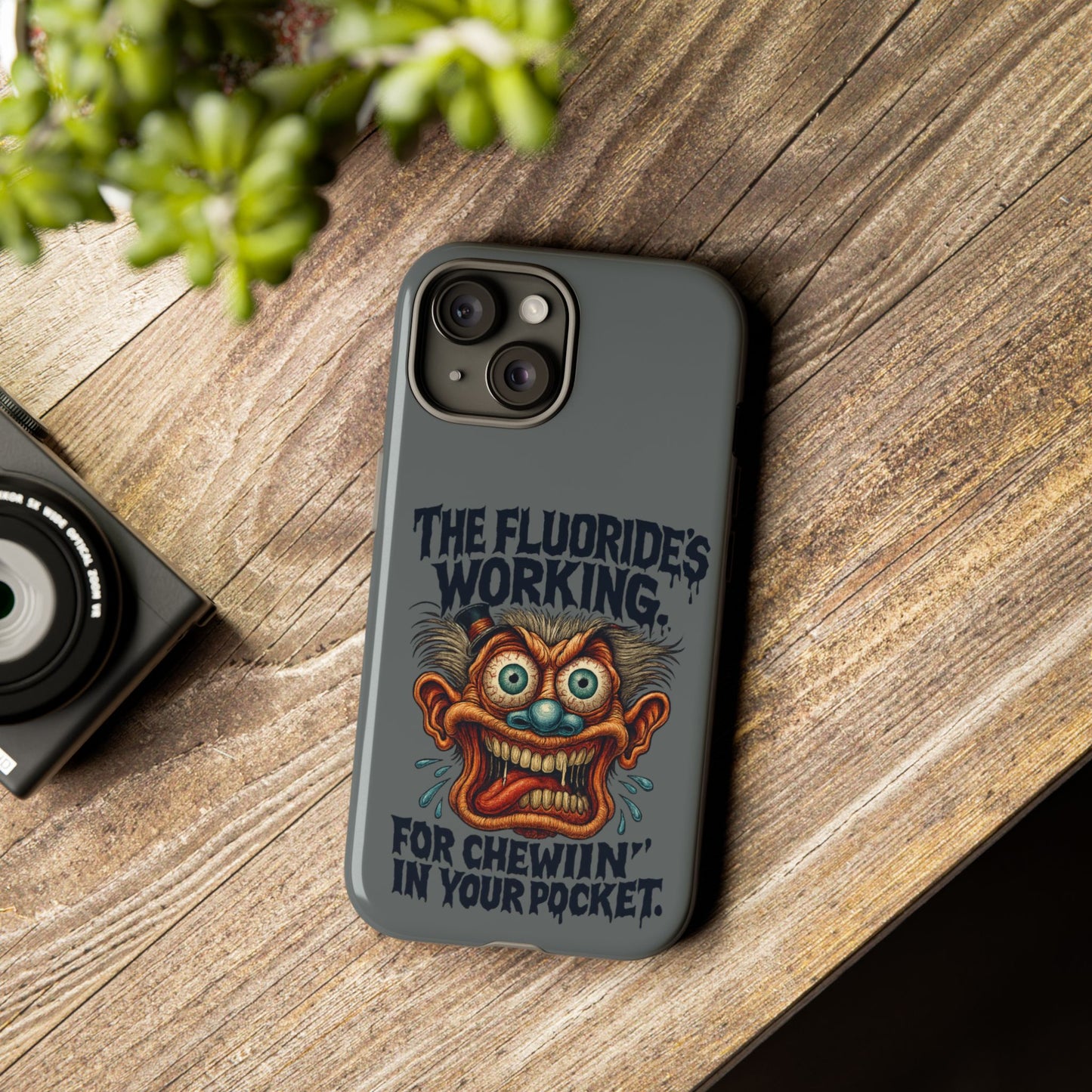 Phone Case — Retro Horror Graphic “The Fluoride’s Working” Shock Art