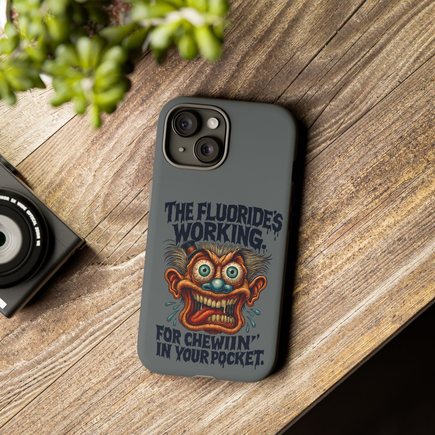 Phone Case — Retro Horror Graphic “The Fluoride’s Working” Shock Art