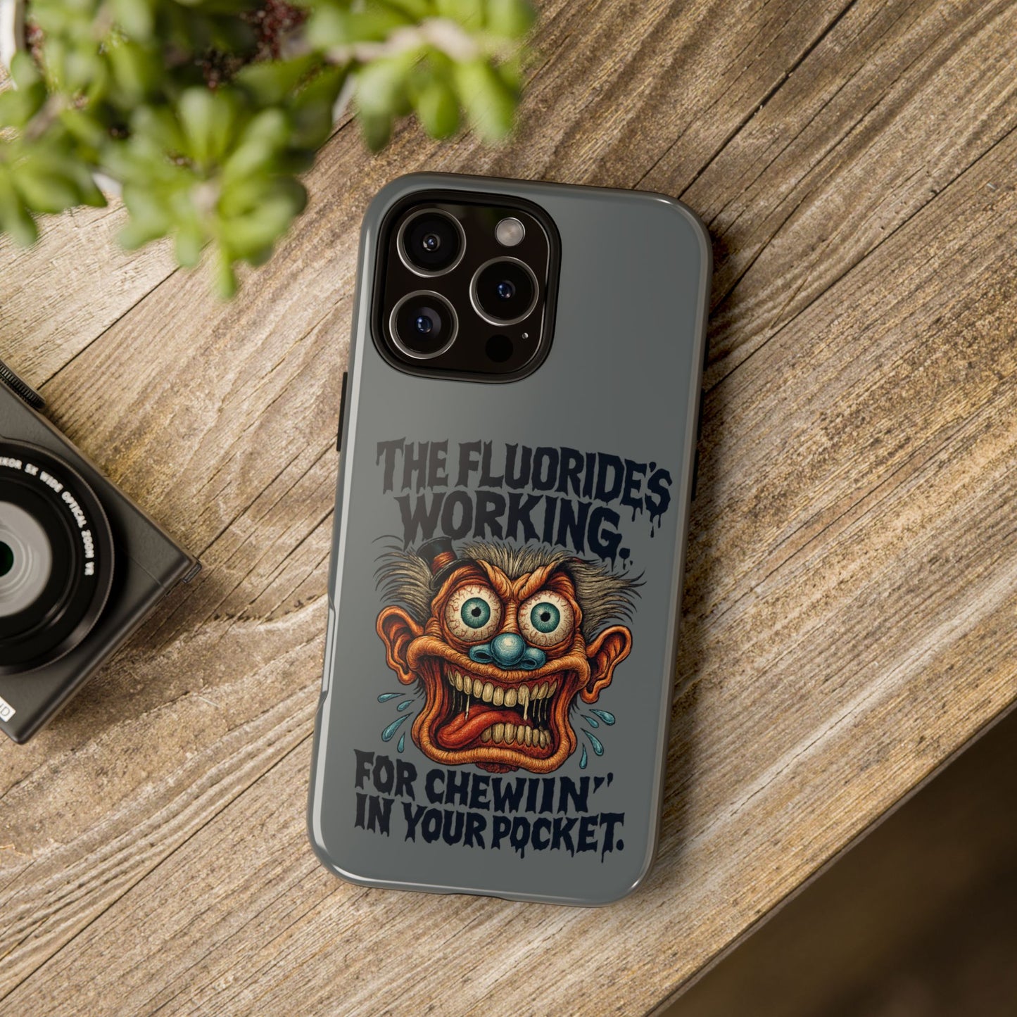 Phone Case — Retro Horror Graphic “The Fluoride’s Working” Shock Art
